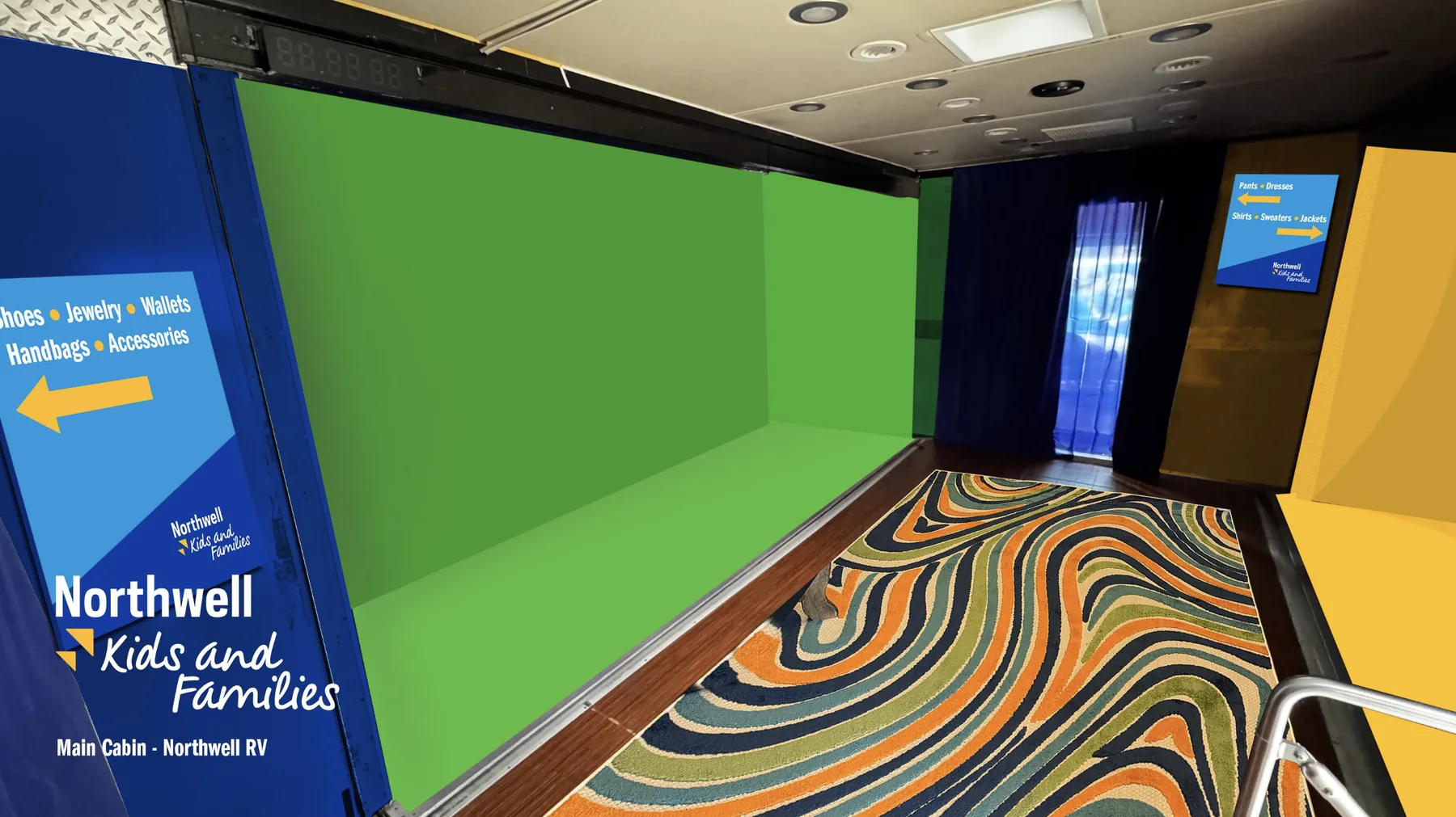 The main cabin rendering: a long green feature wall down one side, patterned floor rug, yellow cabinetry at the far end and blue directional signage panels at both ends pointing toward the clothing and accessory zones.