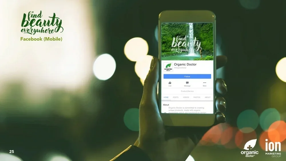 Presentation slide showing a hand holding a phone displaying the Organic Doctor Facebook page with the waterfall cover image.